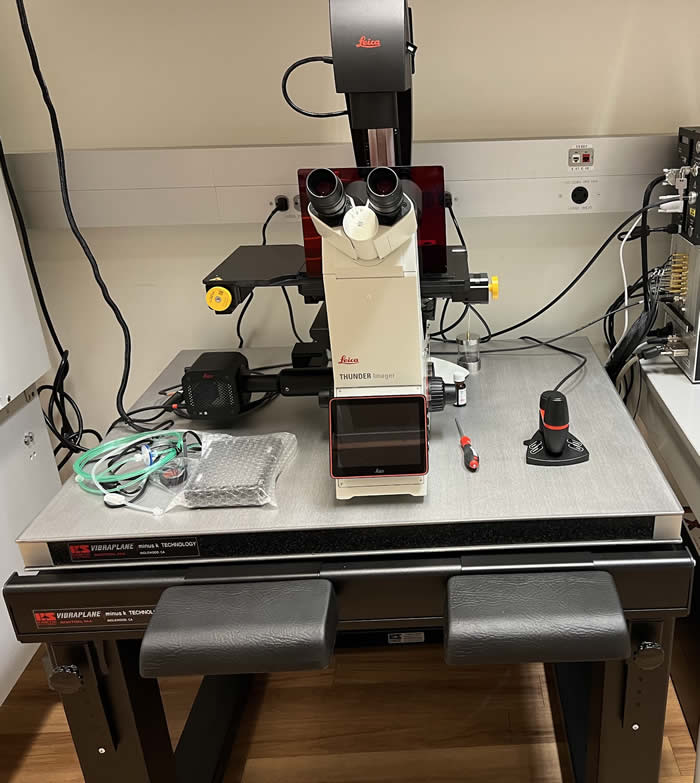 fluorescense microscope on an MK vibration isolation table workstation